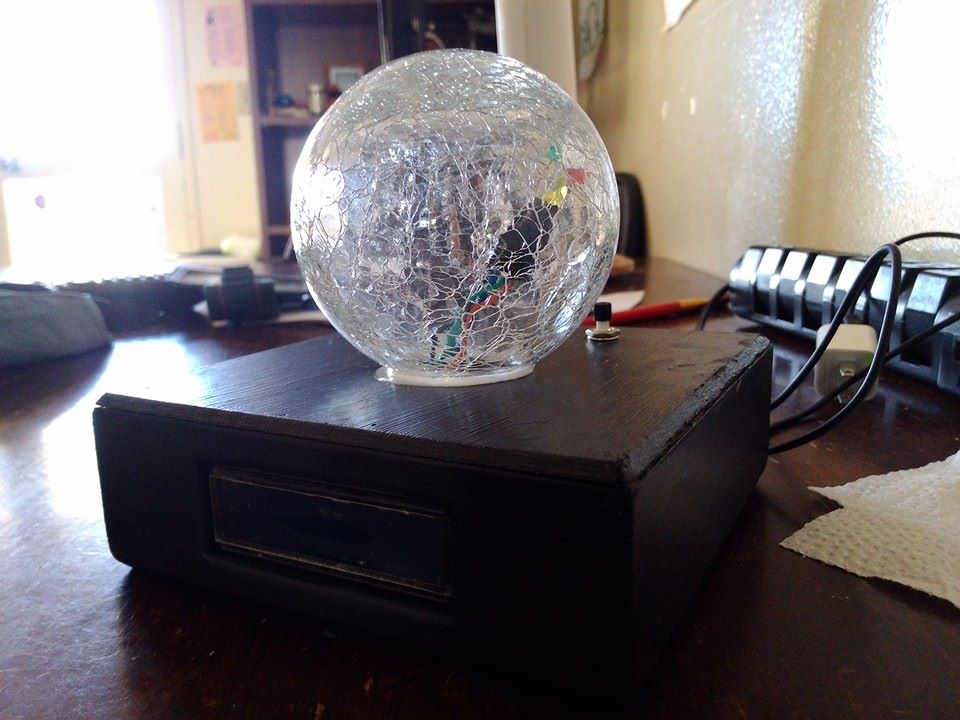 SwellOracle orb lamp glowing on a table